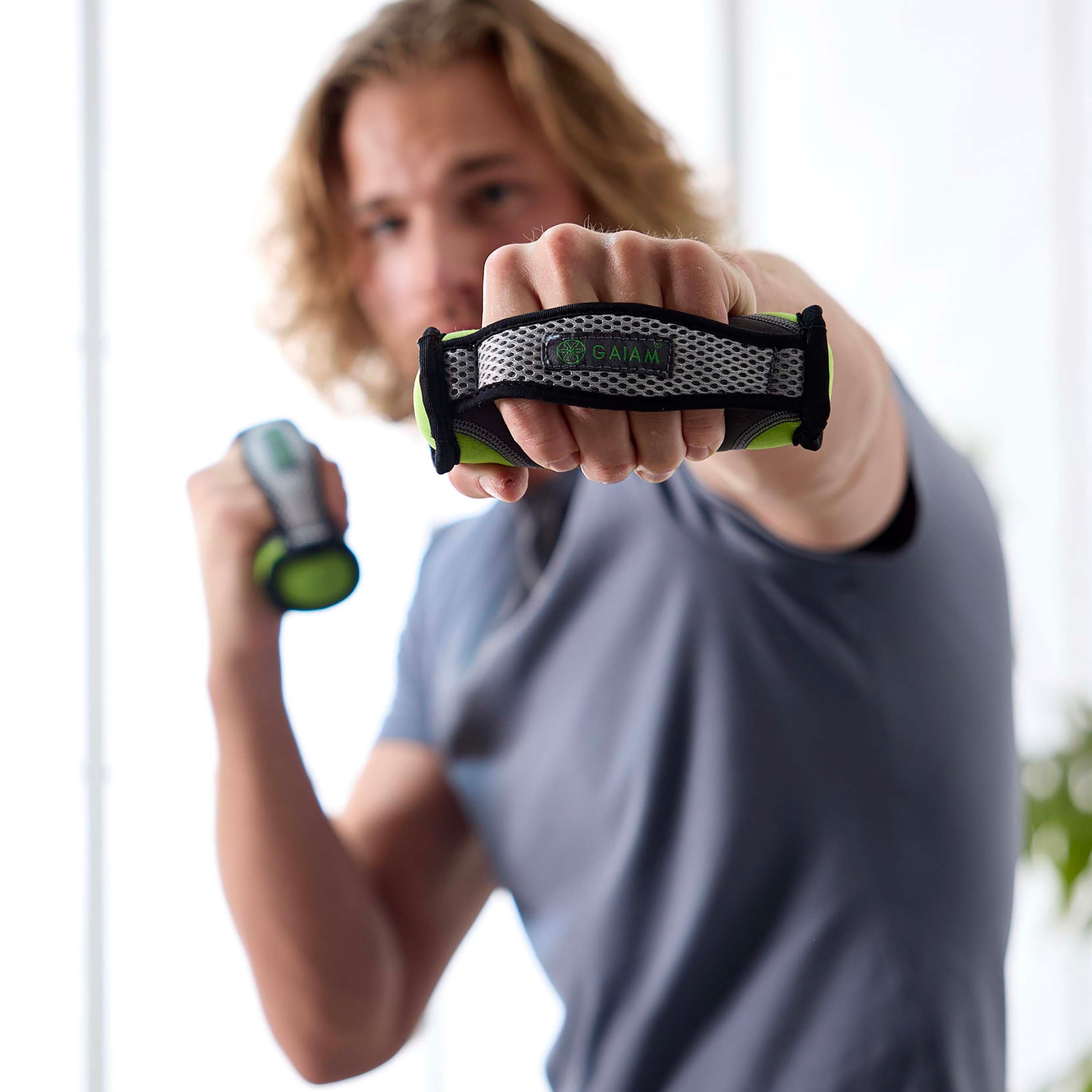 Person holding the Gaiam Walking Weights - up close of the hand - looks as is the weight is coming at you in a punching motion